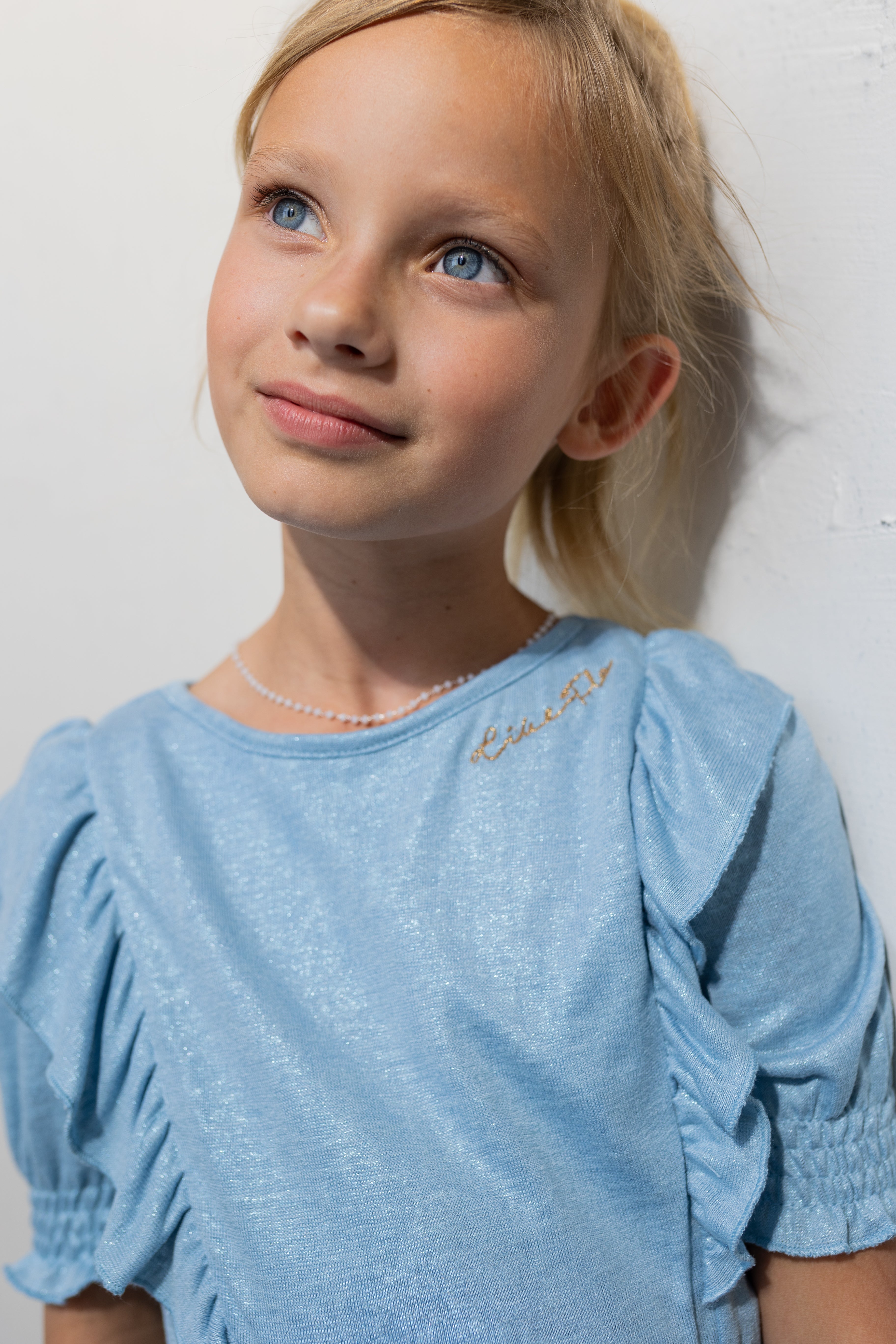 LikeFLO Flo Girls Metallic Jersey Ruffle Dress With Belt - LikeFlo